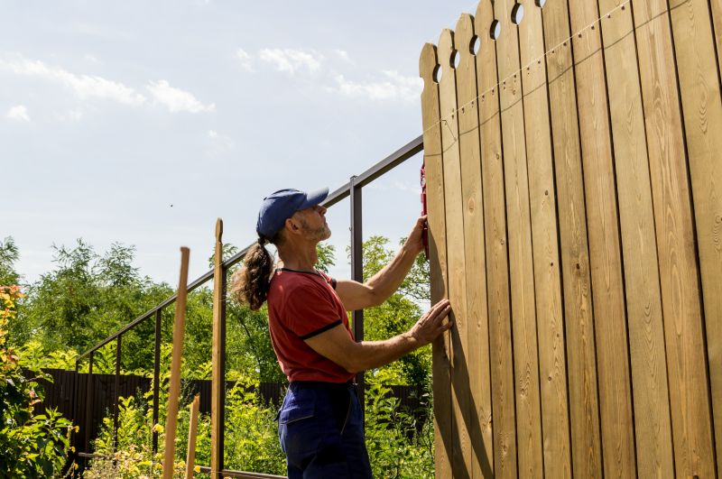 Local Fence Repair And Installation pros at work